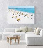 Aerial of yellow umbrellas, white sand and blue sea in Camps Bay Cape Town in an acrylic/perspex frame