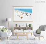 Aerial of yellow umbrellas, white sand and blue sea in Camps Bay Cape Town in a natural fine art frame