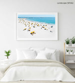 Aerial of yellow umbrellas, white sand and blue sea in Camps Bay Cape Town in a white fine art frame