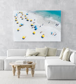 Blue and yellow umbrellas on Camps Bay beach Cape Town from above in an acrylic/perspex frame