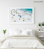 Blue and yellow umbrellas on Camps Bay beach Cape Town from above in a white fine art frame