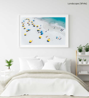 Blue and yellow umbrellas on Camps Bay beach Cape Town from above in a white fine art frame