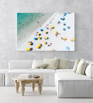 Aerial of green sea and colorful umbrellas from above on Camps Bay beach in an acrylic/perspex frame