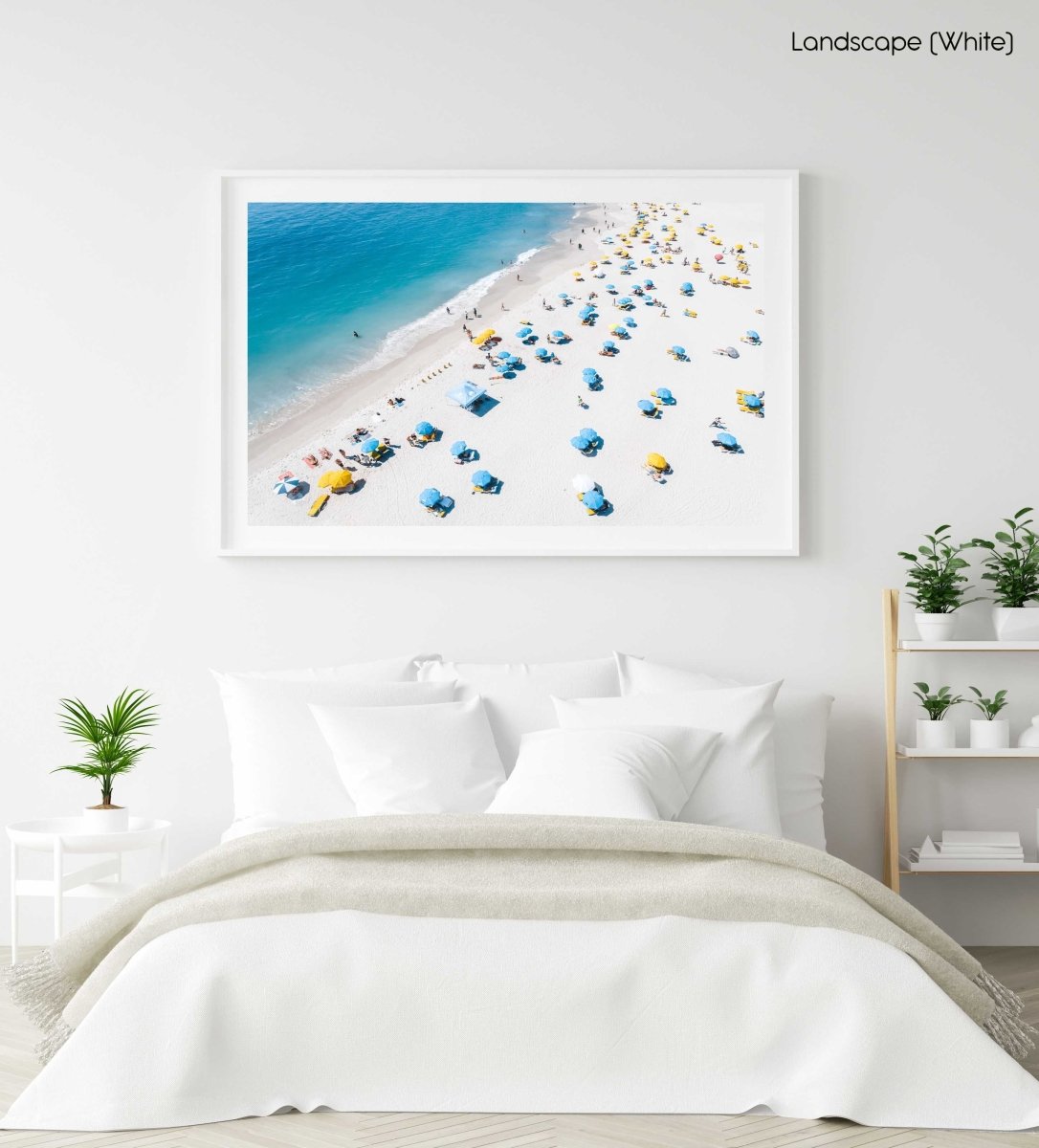 Blue and yellow umbrellas from above on summer day in cape town in a white fine art frame