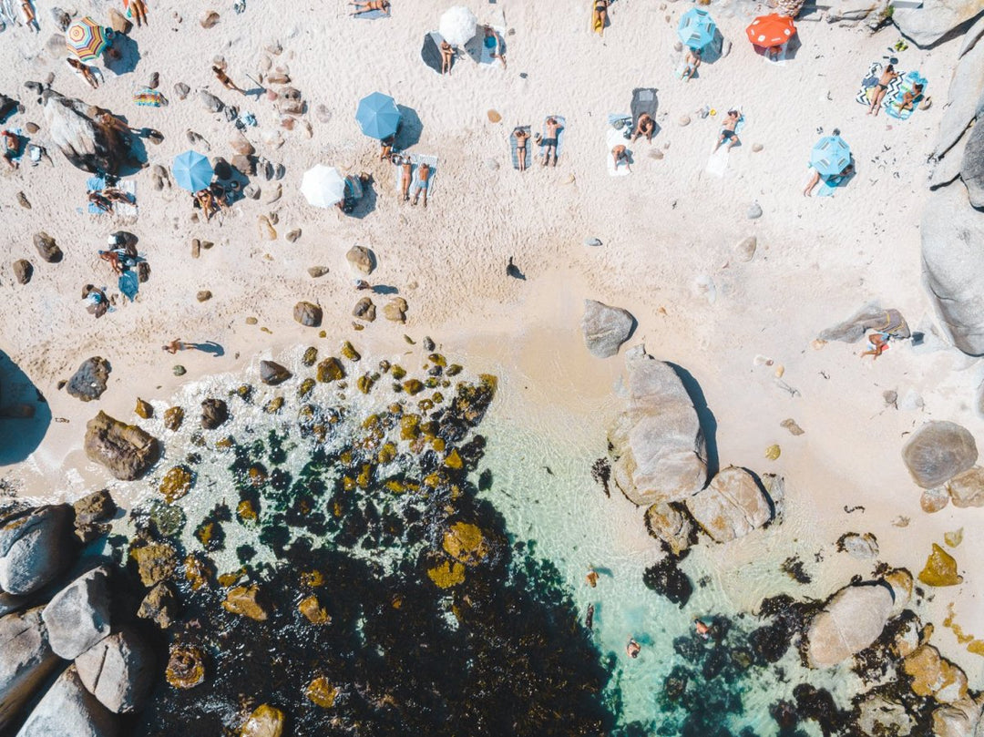 Beach goers and umbrellas from above on Beta Beach Bakoven