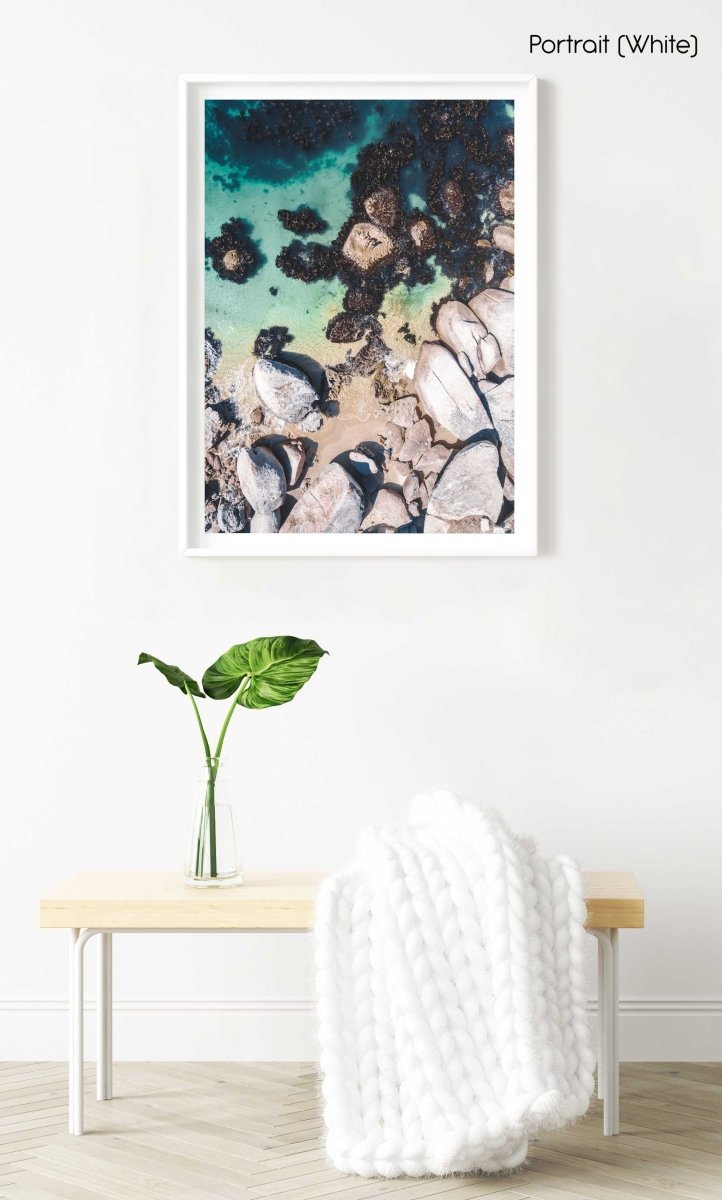Boulders and people from above at green sea in Oudekraal Cape Town in a white fine art frame