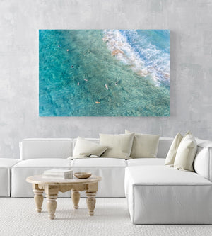 Surfers from above in blue turquoise sea at Manly beach sydney in an acrylic/perspex frame