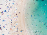 Aerial topdown of blue water and tanning people at Shelly Beach Manly Sydney