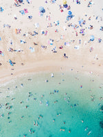 Aerial topdown of blue water and tanning people at Shelly Beach Manly Sydney