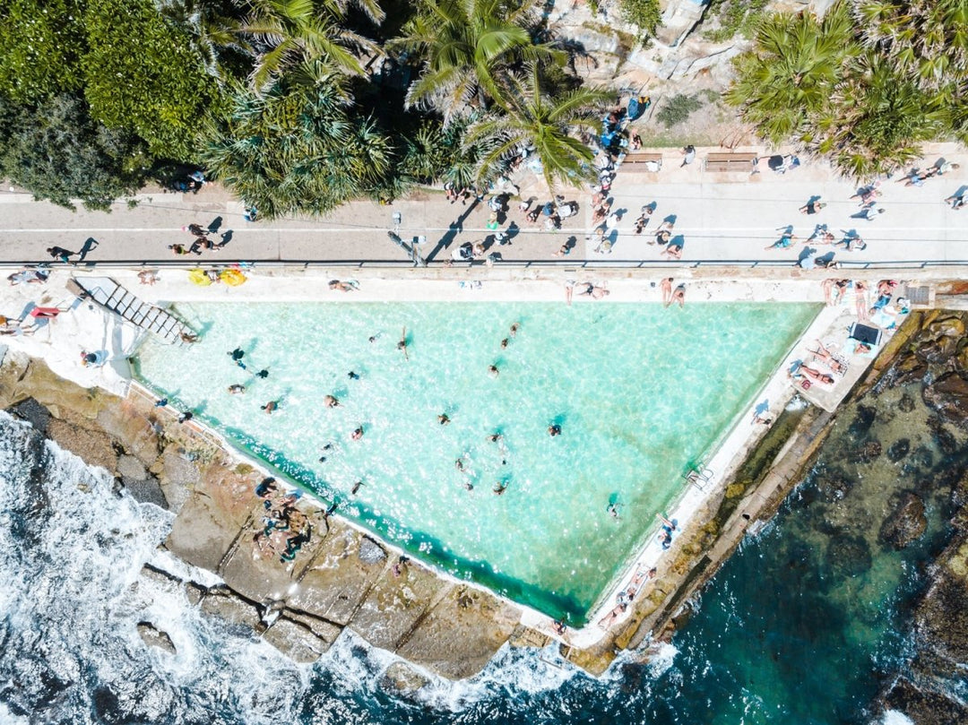 People swimming at Bower pool at Shelly Beach in Manly from above