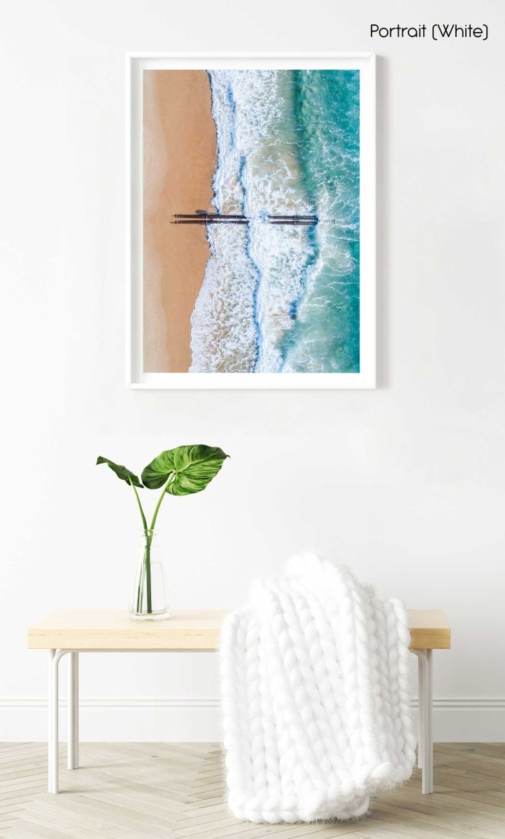 Aerial of beach pipes in ocean waves on Manly Beach Sydney in a white fine art frame