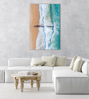 Aerial of beach pipes in ocean waves on Manly Beach Sydney in a natural fine art frame