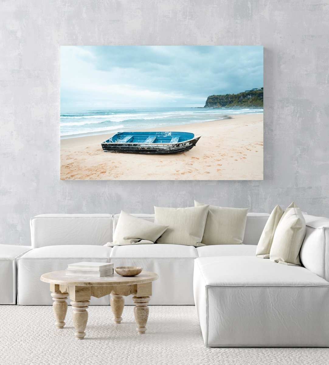 Stranded blue boat on northern beaches on cloudy day in an acrylic/perspex frame