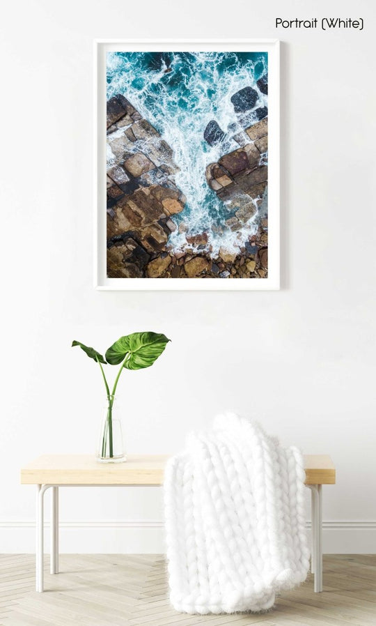 Water crashing from sea into rocks along Sydney coast in a white fine art frame