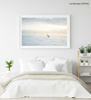 Neutral surfers lined up in water for sunrise surf on Manly Beach Sydney in a white fine art frame