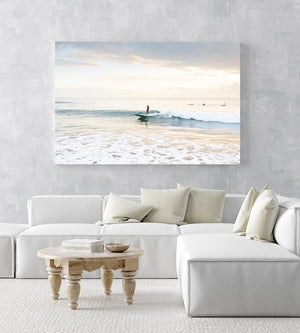 Girl surfing on a wave during sunrise on Manly Beach in Sydney in an acrylic/perspex frame