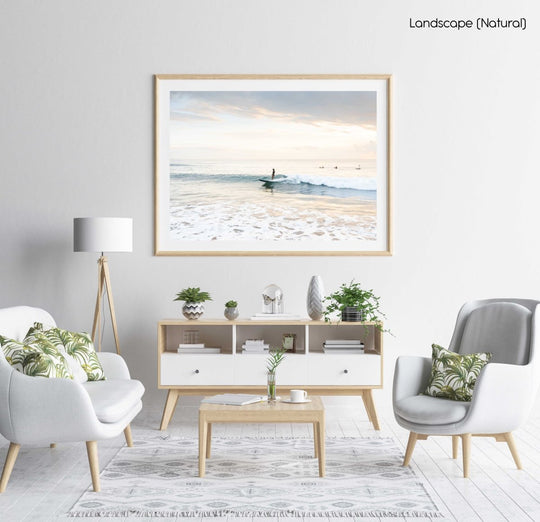 Girl surfing on a wave during sunrise on Manly Beach in Sydney in a natural fine art frame