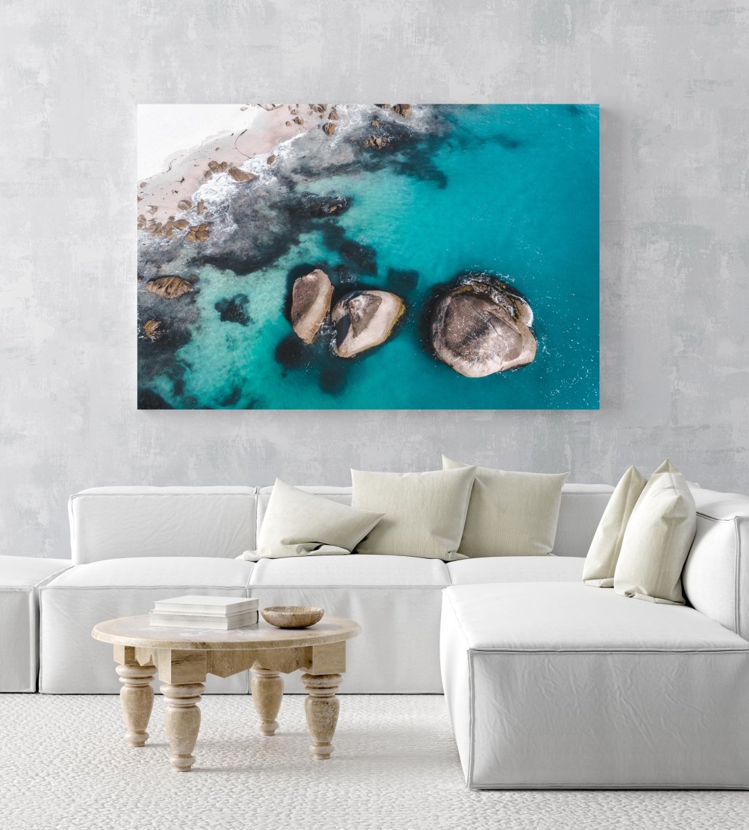 Aerial of three big boulders in blue Atlantic Sea in Clifton Cape Town in an acrylic/perspex frame