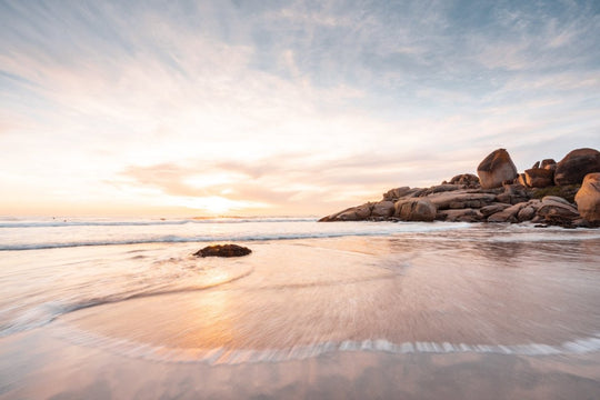 Long exposure of waves and sunset at Llandudno Beach Cape Town