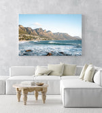 Windy offshore wave at Camps Bay Beach with Twelve Apostles mountains in an acrylic/perspex frame