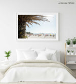 Palm tree and people sunbathing at Clifton fourth beach in Cape Town in summer in a white fine art frame