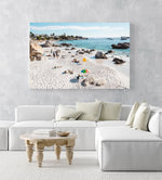 People tanning along the coast of Clifton in Cape Town in an acrylic/perspex frame