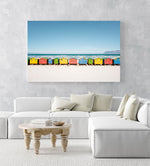 A row of colorful huts along Muizenberg Beach in an acrylic/perspex frame