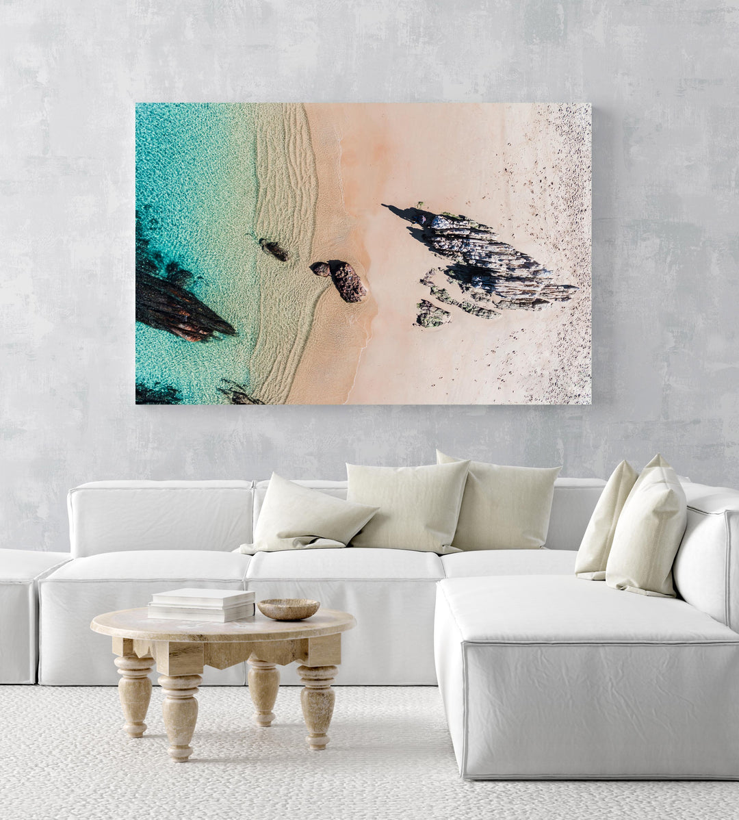 Aerial of a jagged rock along Kalk Bay coast in a white fine art frame