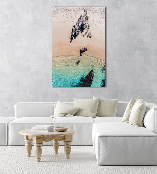 Aerial of a jagged rock along Kalk Bay coast in a natural fine art frame