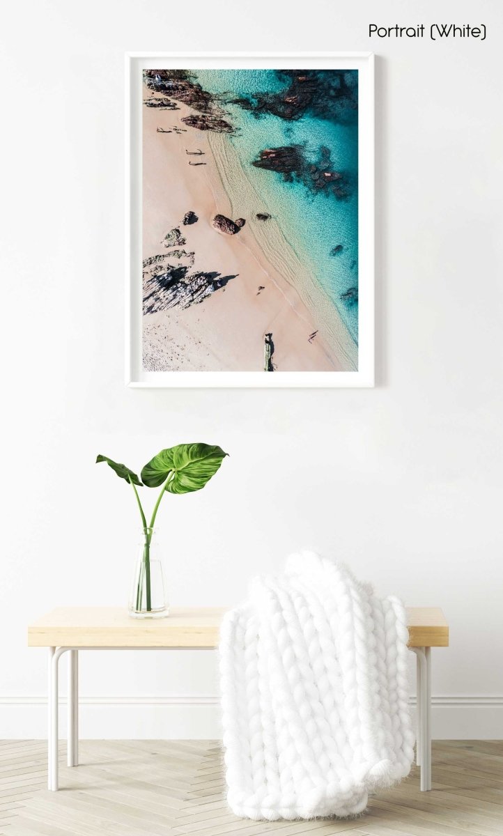 Aerial of kids playing on a beach in Kalk Bay in a white fine art frame