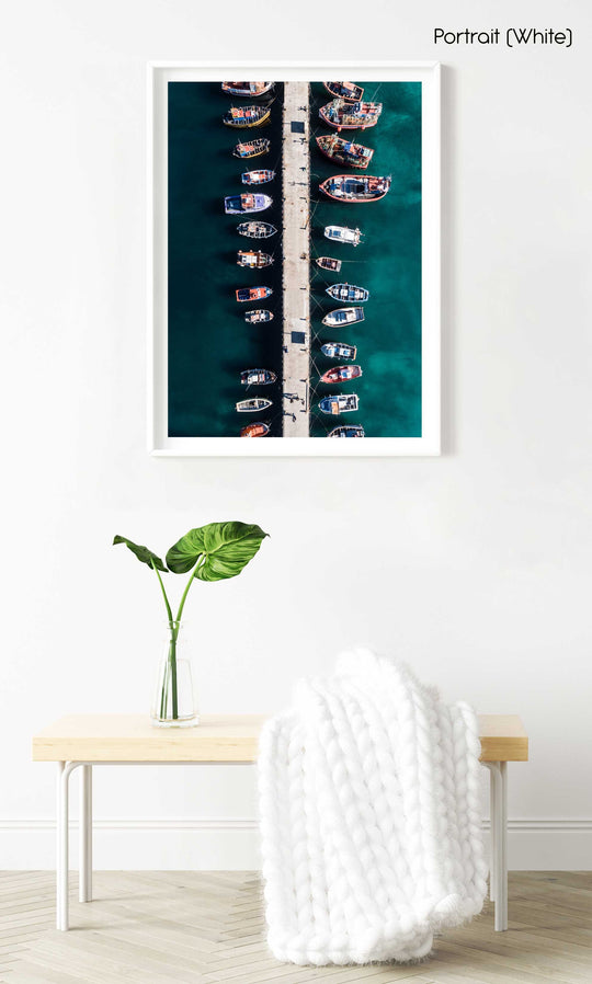 Aerial of boats docked in dark water at Kalk Bay harbour in a white fine art frame