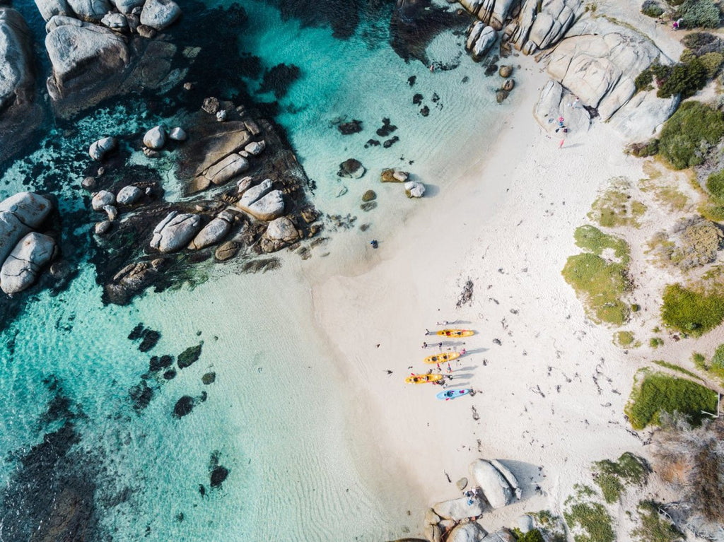 Kayaks on Windmill Beach in Simons Town from above