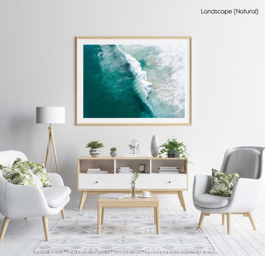 Big wave breaking in dark turquoise Noordhoek Beach from the air in a natural fine art frame