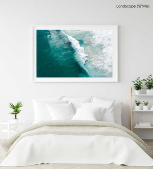 Big wave breaking in dark turquoise Noordhoek Beach from the air in a white fine art frame
