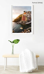 Docked boats and colorful buildings at sunset in Riomaggiore Cinque Terre in a white fine art frame