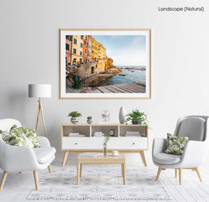 Slipway and people walking along ocean in Riomaggiore in a natural fine art frame