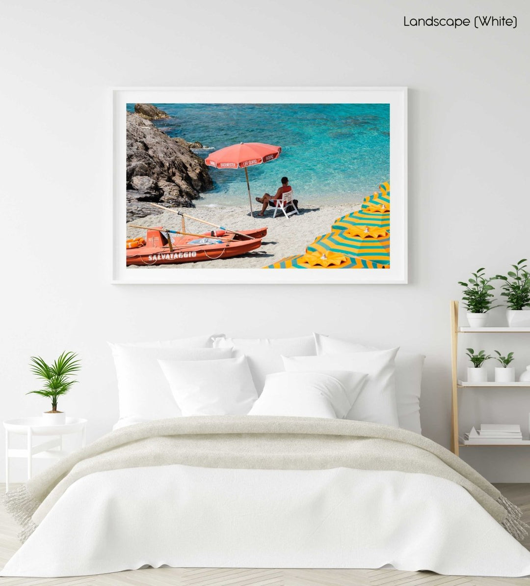 Italian lifeguard sitting under umbrella at blue water on Monterosso Beach in a white fine art frame