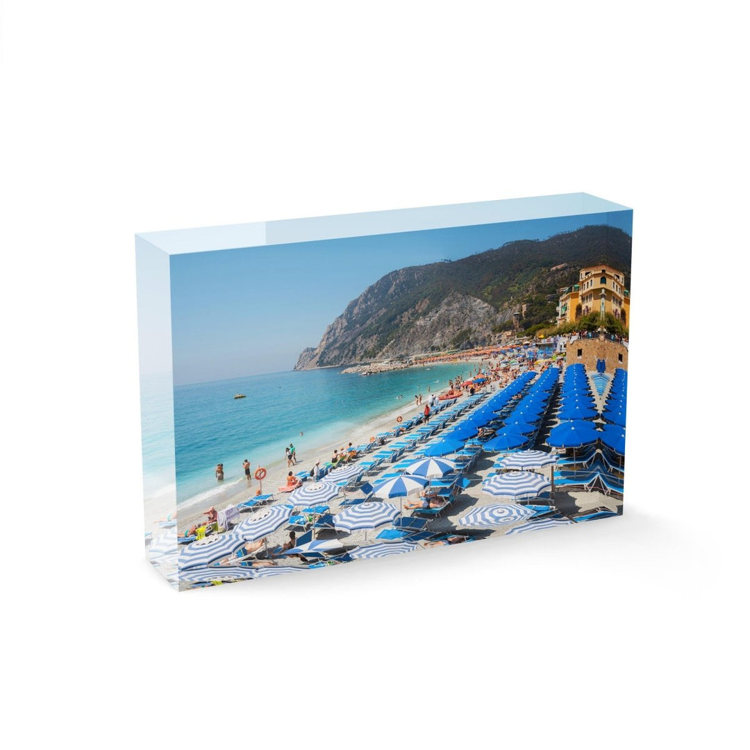 People and umbrellas at Monterosso beach Cinque Terre during summer