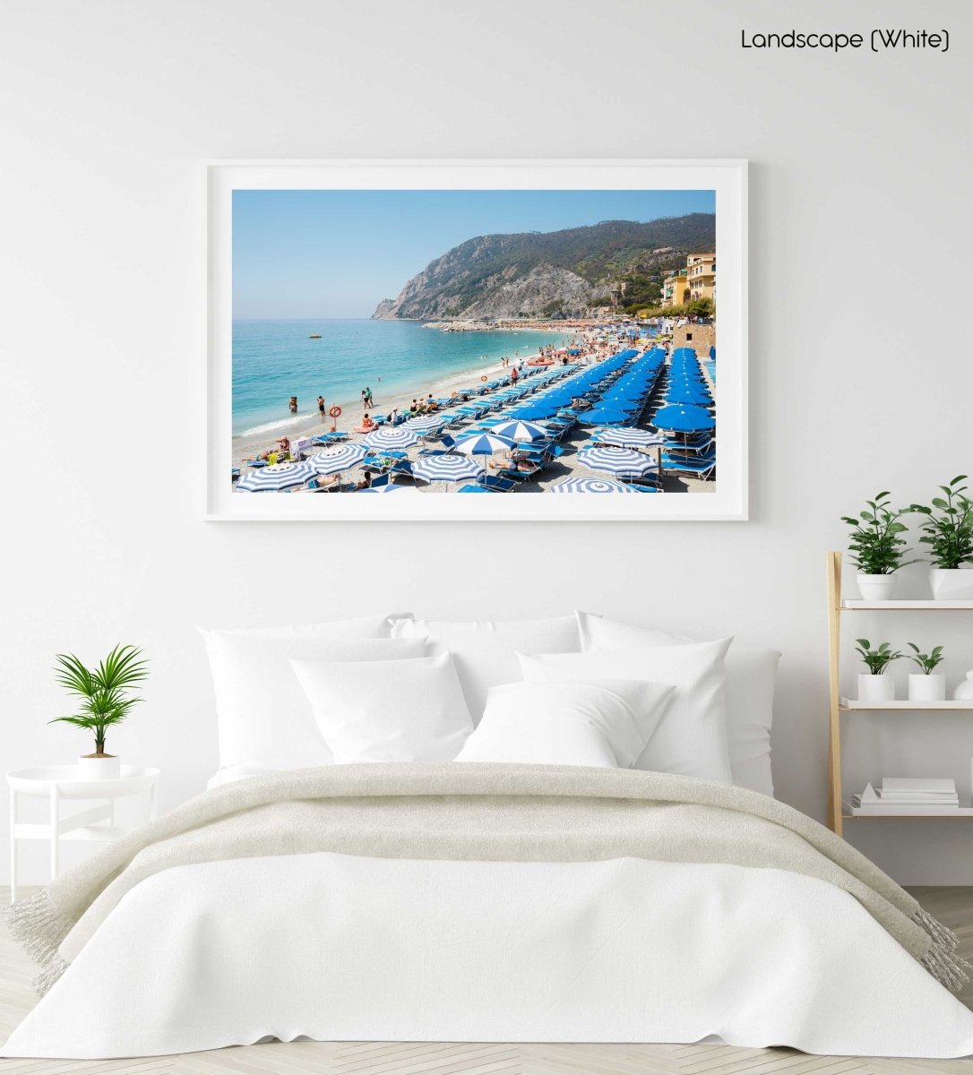People and umbrellas at Monterosso beach Cinque Terre during summer in a white fine art frame