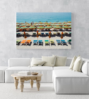Orange, green and blue colors of umbrellas and sea in Cinque Terre in an acrylic/perspex frame