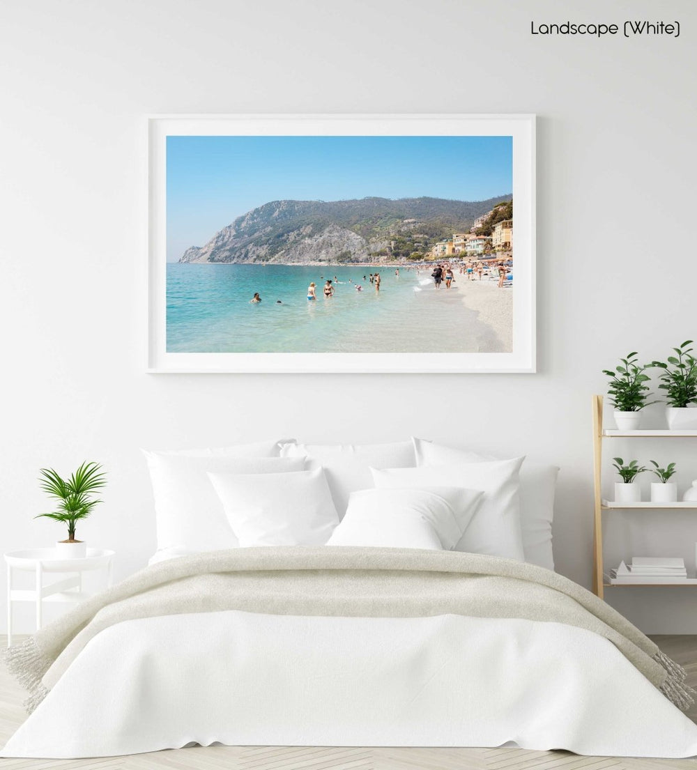 Hot sunny day with people swimming at Monterosso beach Italy in a white fine art frame