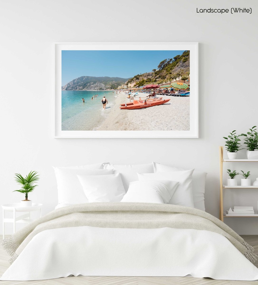 Italian vibes along Monterosso beach with people swimming and lying at water in a white fine art frame