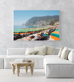 Orange umbrellas and people tanning on Monterosso Beach Cinque Terre in an acrylic/perspex frame