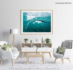 Aerial of two waves breaking in blue ocean in Cape Town in a natural fine art frame