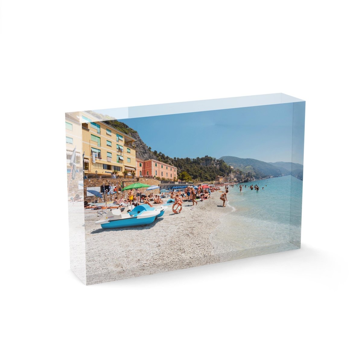 People swimming and lying on italian beach during summer