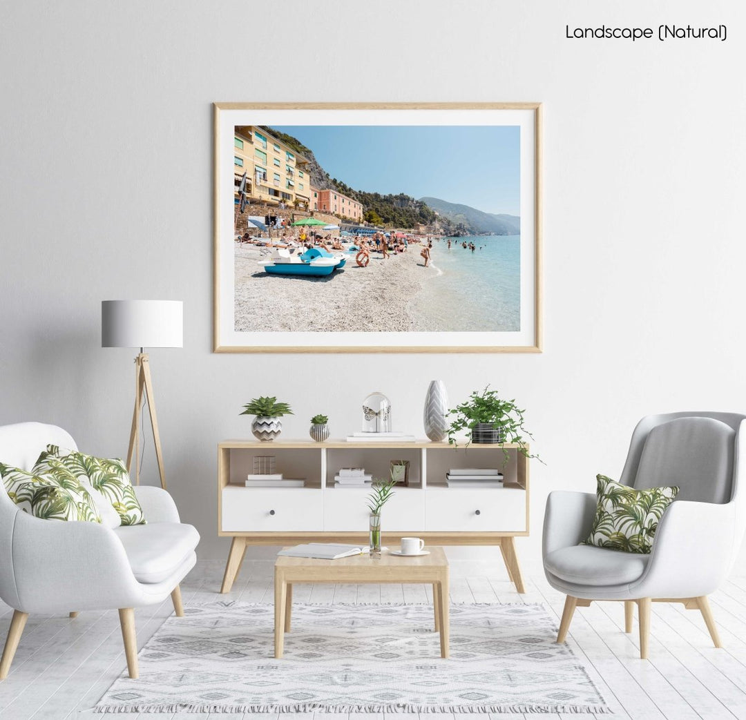 People swimming and lying on italian beach during summer in a natural fine art frame