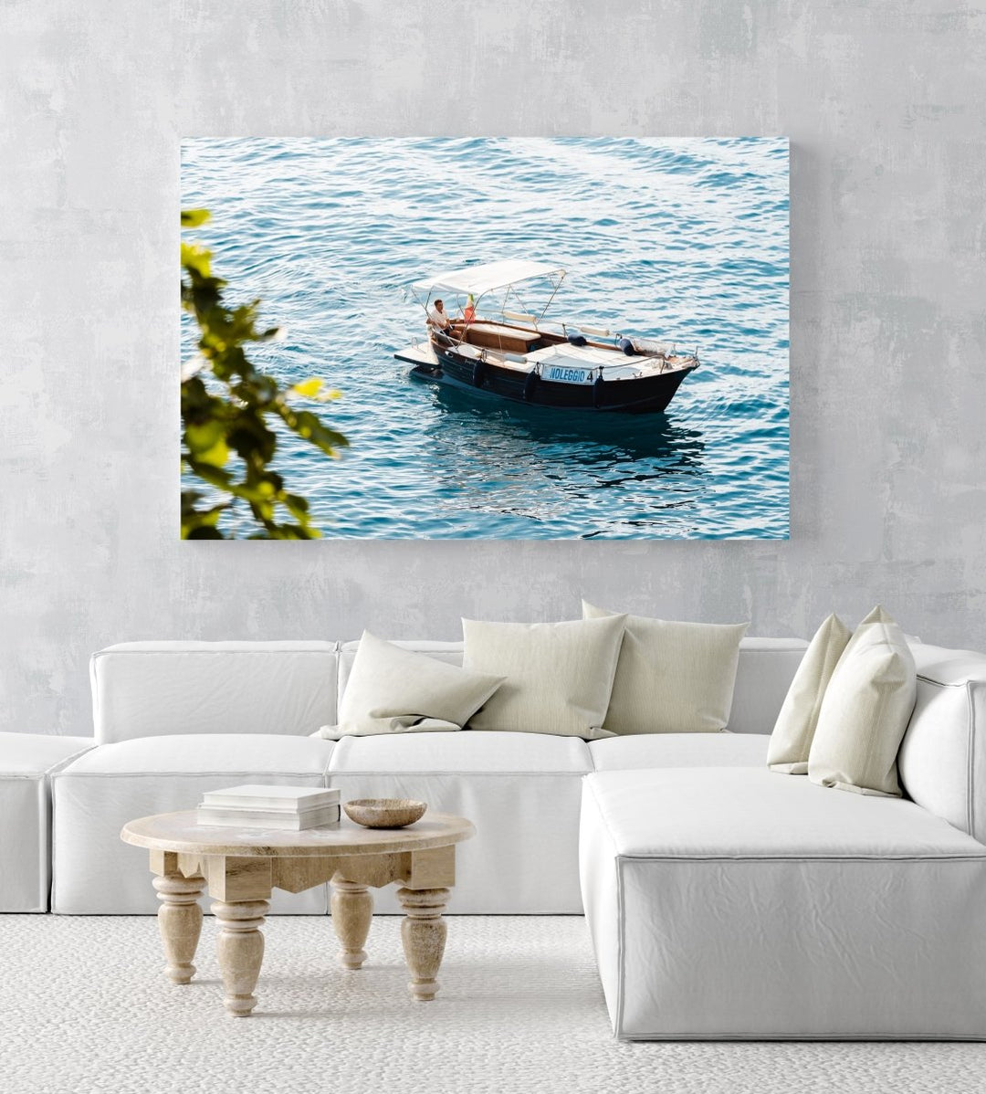 Man driving a rental boat along Cinque Terre coastline in an acrylic/perspex frame