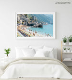 People enjoying the sun and ocean in Cinque Terre in a white fine art frame