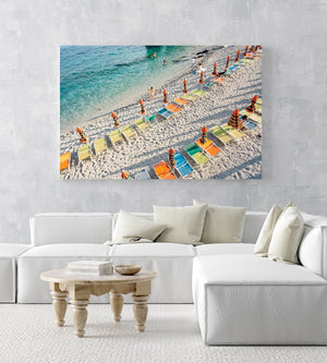 Orange, green and blue chairs on beach in Cinque Terre in an acrylic/perspex frame