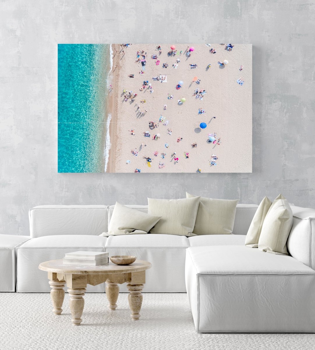 Busy beach day in Lloret de Mar during summer from aerial point in a white fine art frame